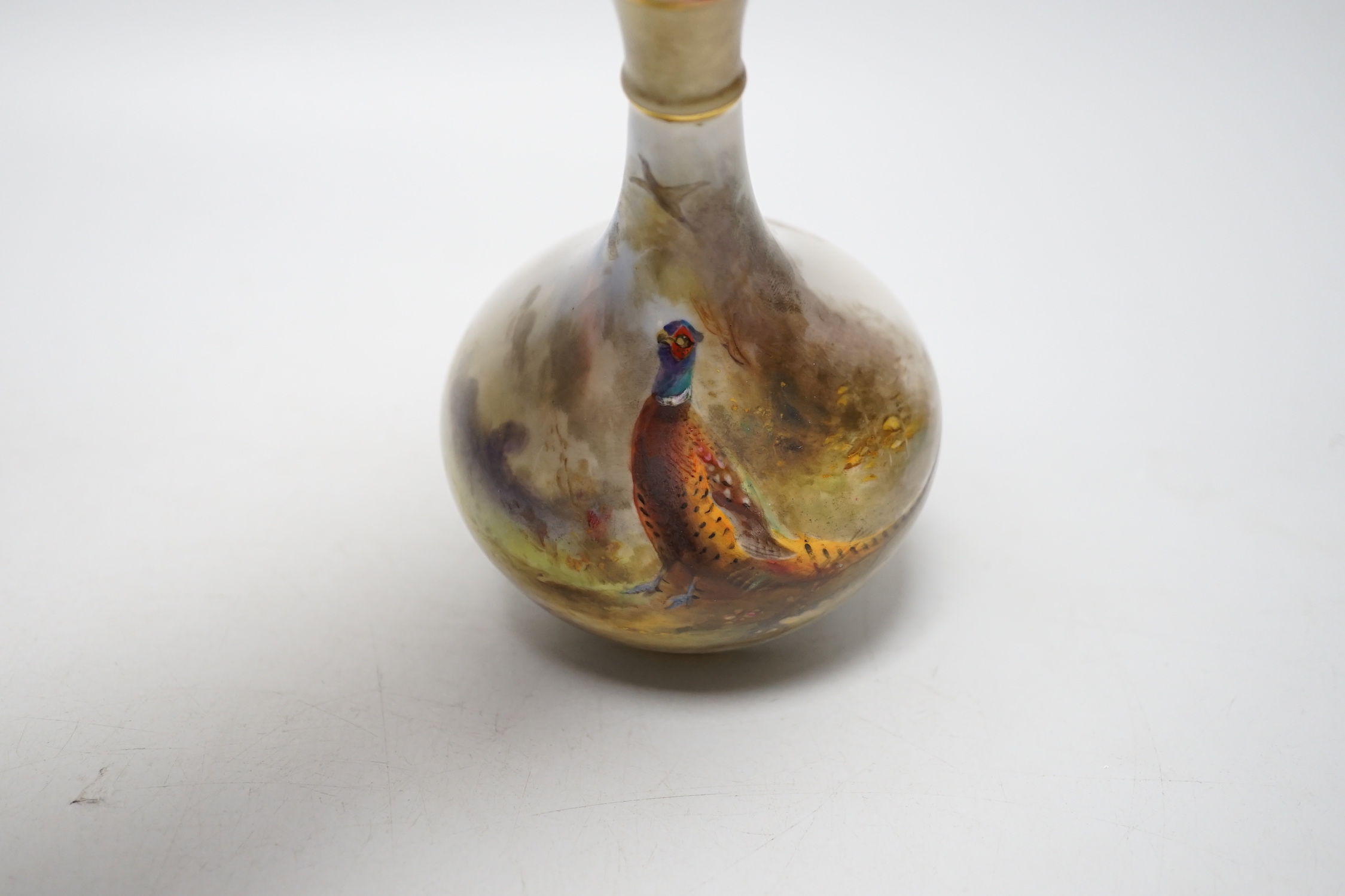 A Royal Worcester painted porcelain ‘pheasant’ vase, model number 702, signed 702